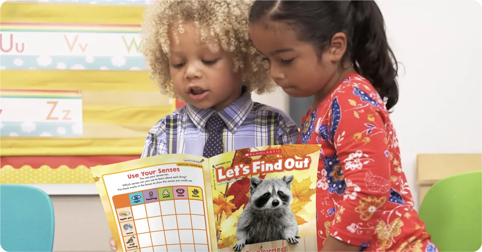 Children reading Scholastic Let's Find Out